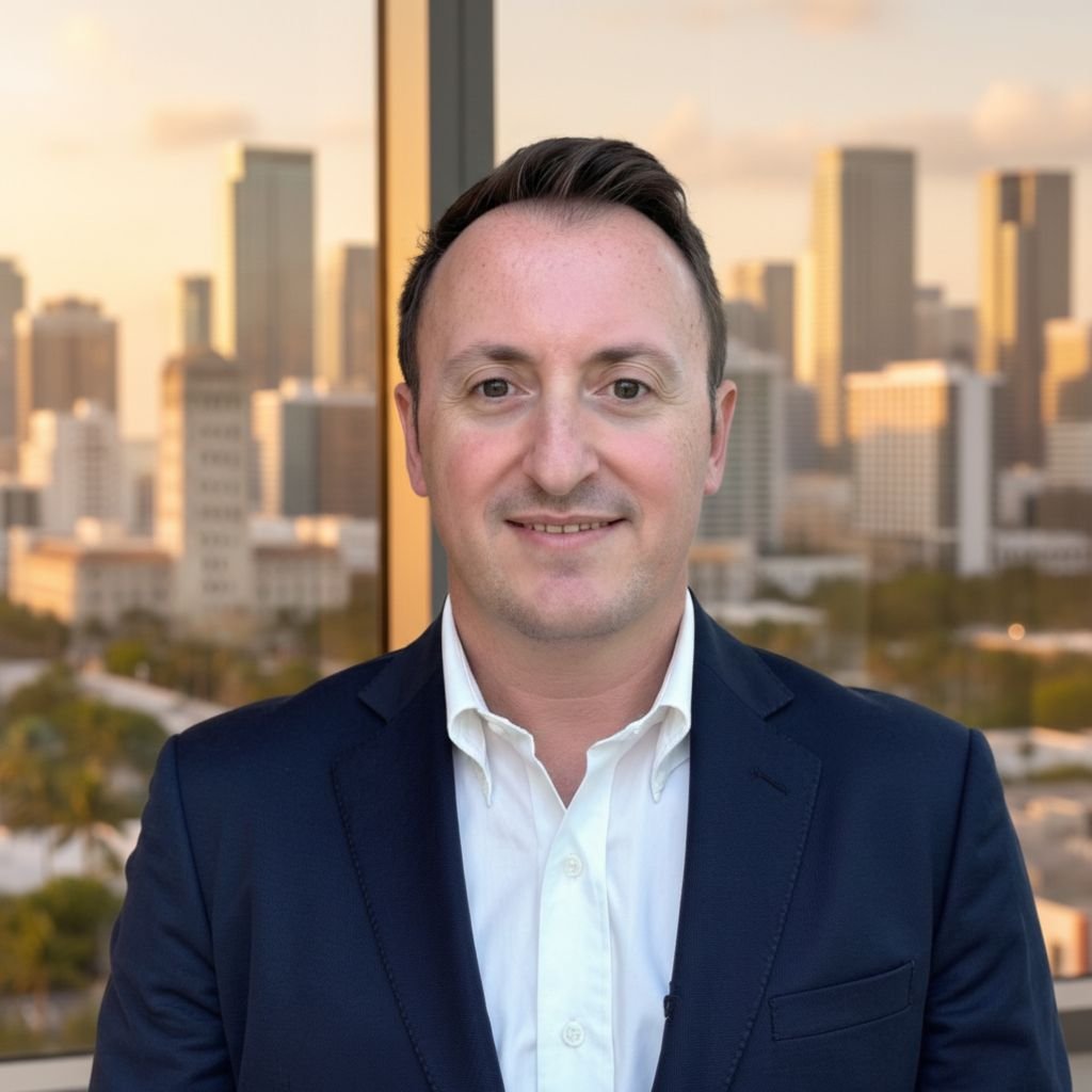 Professional businessman in suit standing in front of a city skyline representing E-2 Visa business Florida opportunities